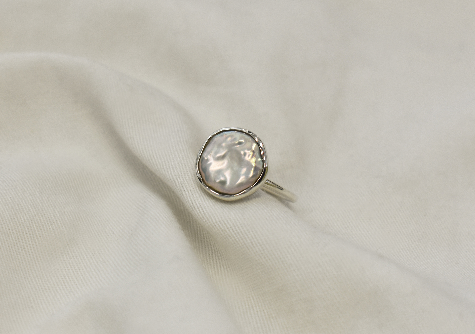 Calypso pearl ring 1 k